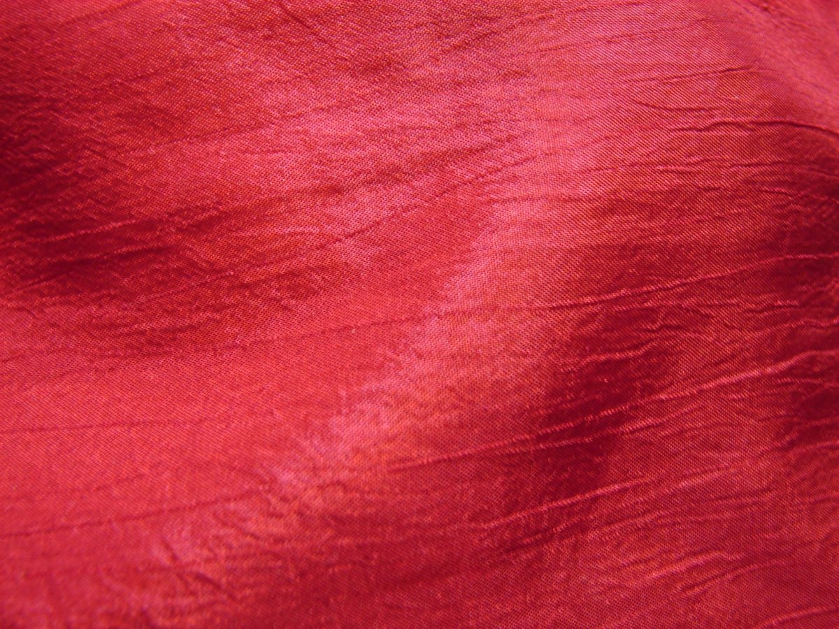 Текстура красной ткани
